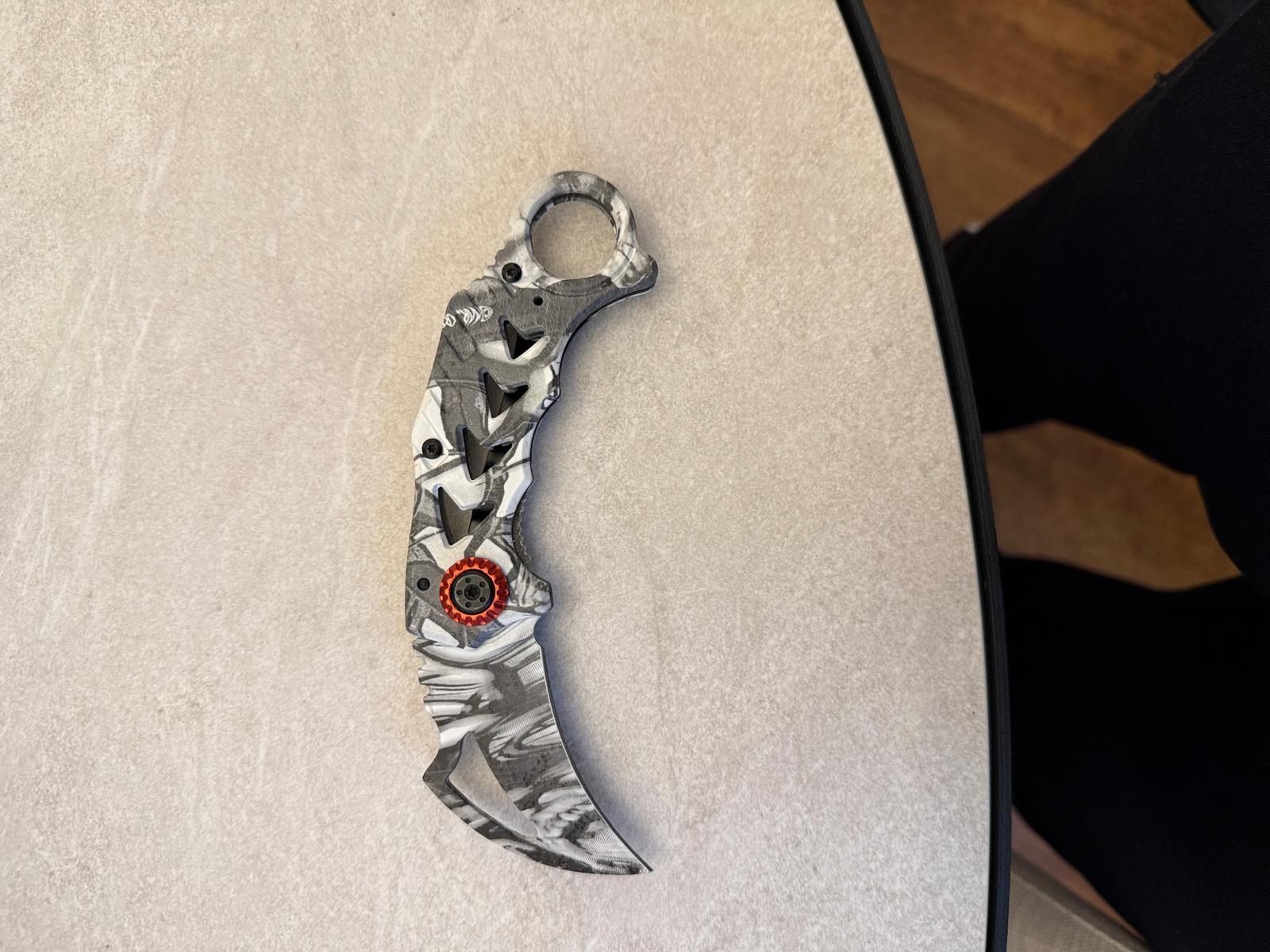 Silver Gothic-Face Curved-Blade Folder with Red Gem