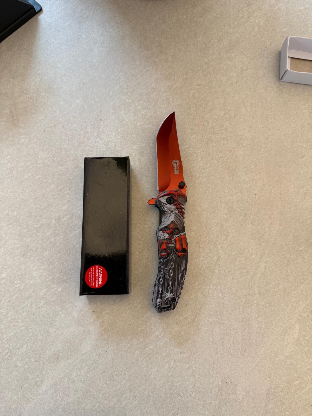 Skull-Print Stiletto Knife with Red Blade